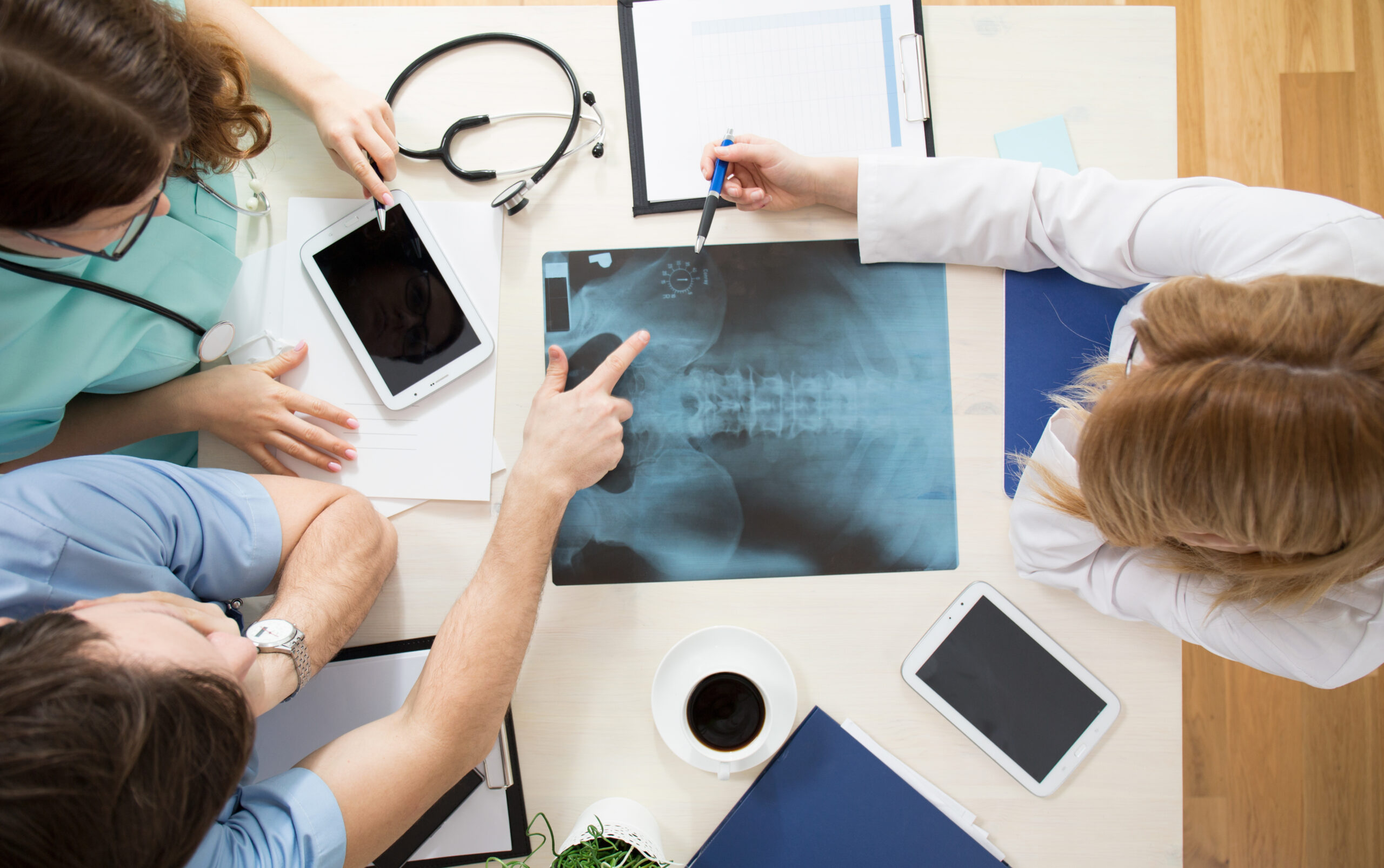 Doctors looking at an x-ray image